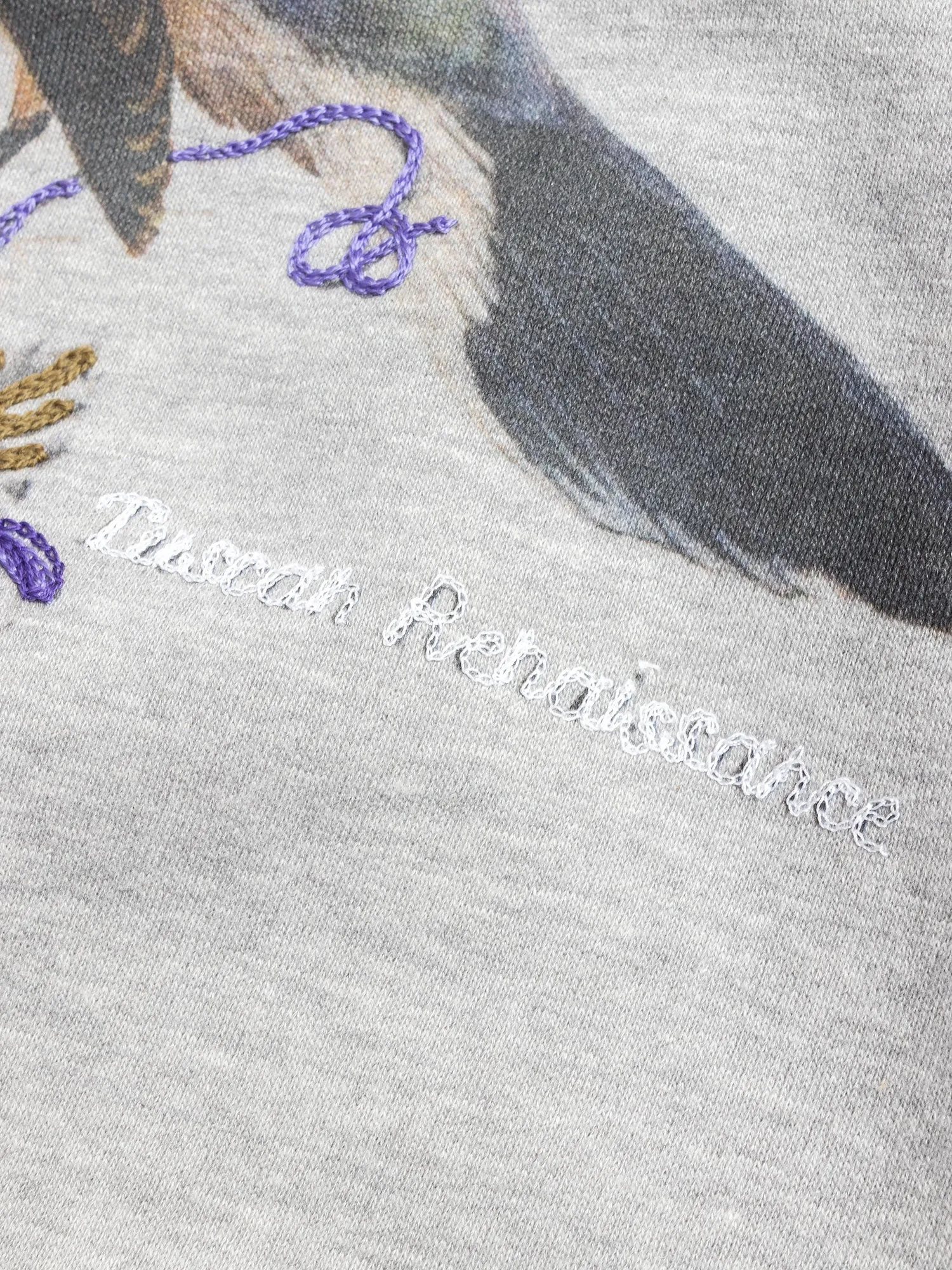 "Shrike" Embroidered Crewneck Sweater in Grey