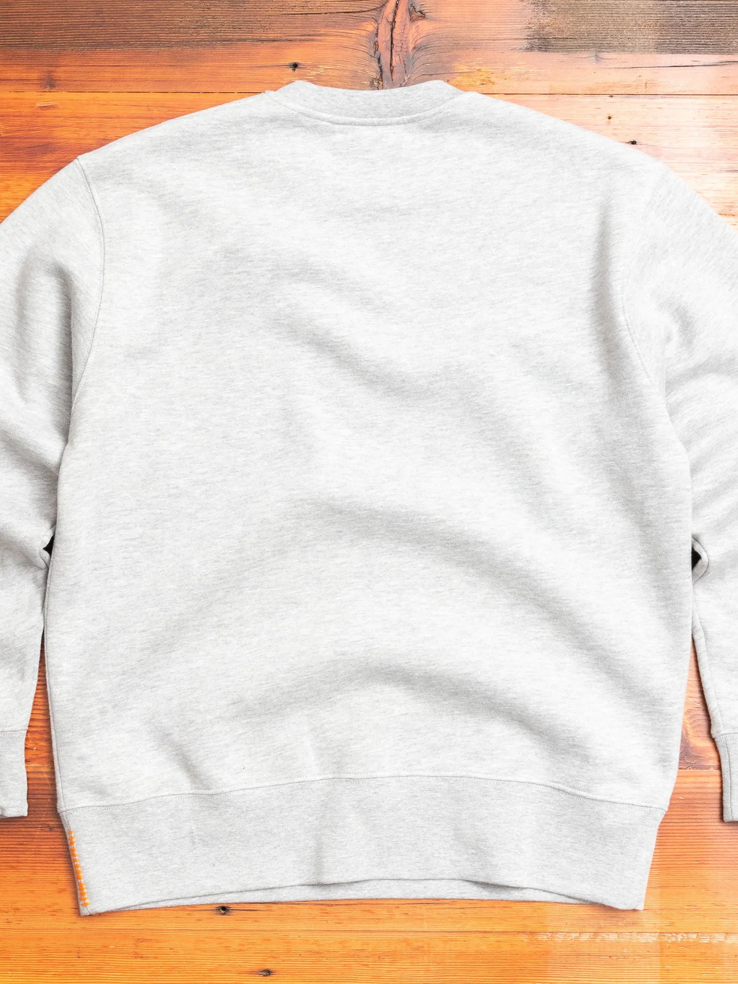 "Shrike" Embroidered Crewneck Sweater in Grey